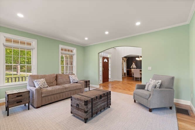 343 Bay Road Hamilton, MA 01982 - Photo 11 of 34 a living room with furniture and a large window