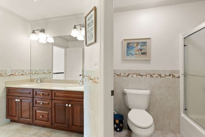 343 Bay Road Hamilton, MA 01982 - Photo 19 of 34 a bathroom with a granite countertop toilet a sink and a mirror