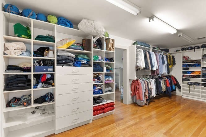 343 Bay Road Hamilton, MA 01982 - Photo 24 of 34 a view of walk in closet with clothes and shoes