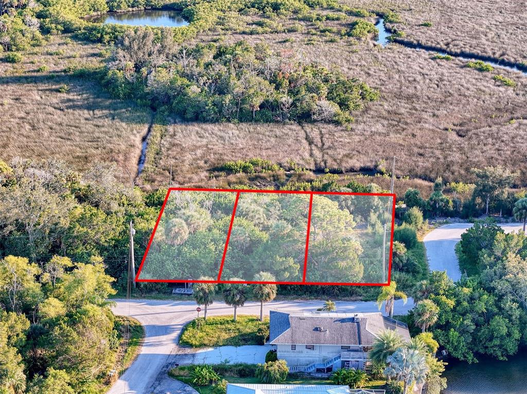 12 Nowiki Avenue Hudson, FL 34667 - Photo 10 of 20 a view of a yard with outdoor seating