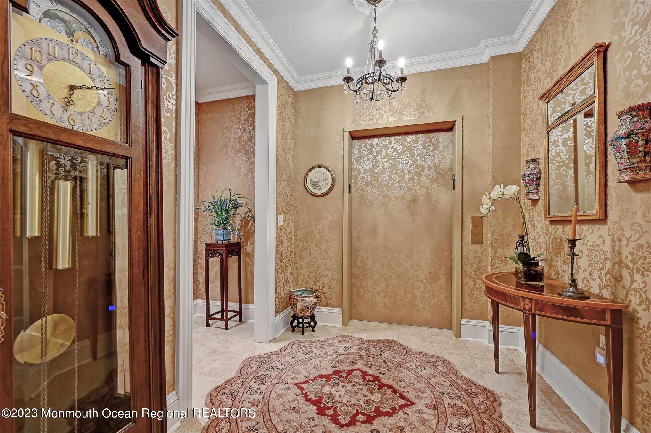 232 Oval Road Manasquan, NJ 08736 - Photo 2 of 56 02-Foyer with private elevator entrance