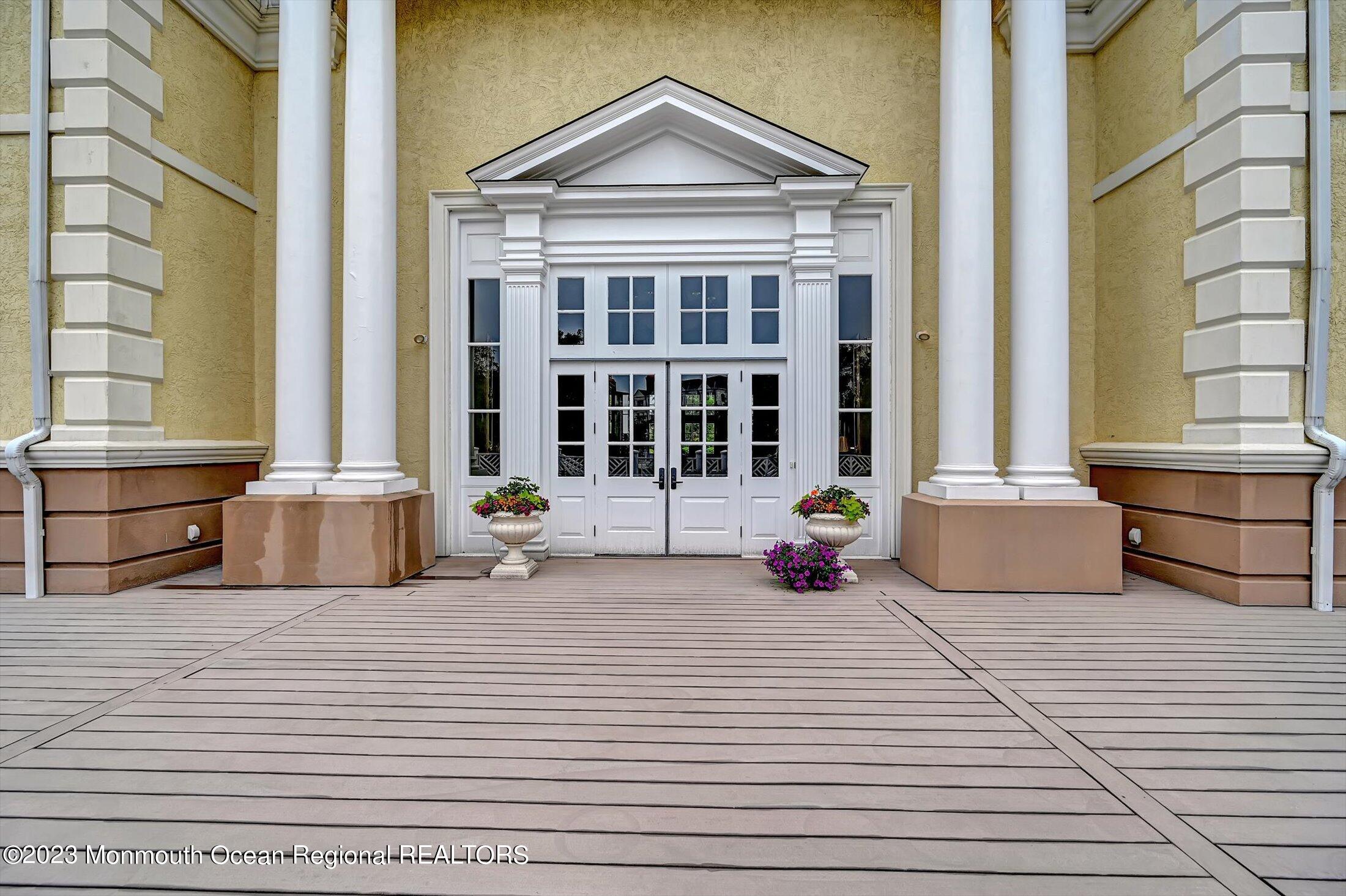 232 Oval Road Manasquan, NJ 08736 - Photo 45 of 56 43-Clubhouse Back Deck entrance