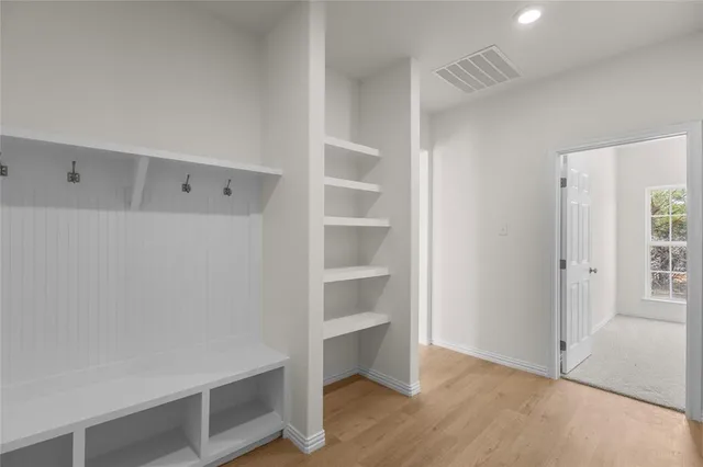 a view of an empty walk in closet