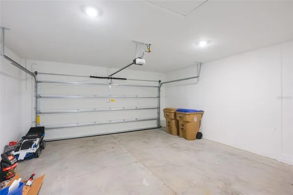 a view of storage and utility room with empty racks