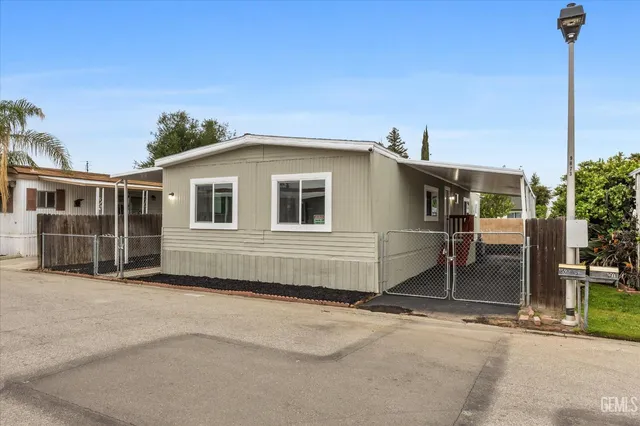 a front view of a house with a garage