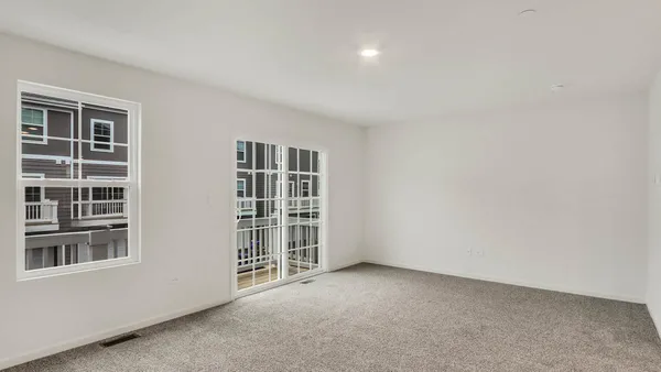an empty room with windows