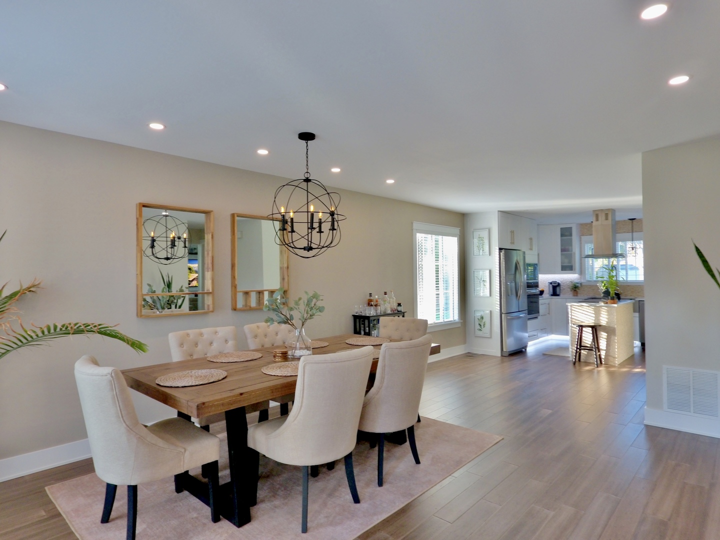 1407 Canyon Run Road Naperville, IL 60565 - Photo 2 of 22 a view of a dining room with furniture and wooden floor