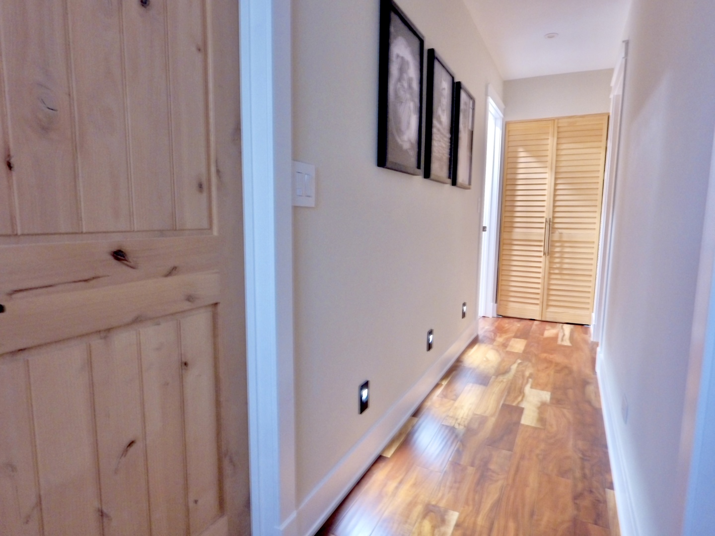 1407 Canyon Run Road Naperville, IL 60565 - Photo 15 of 22 a view of a hallway with wooden floor and staircase