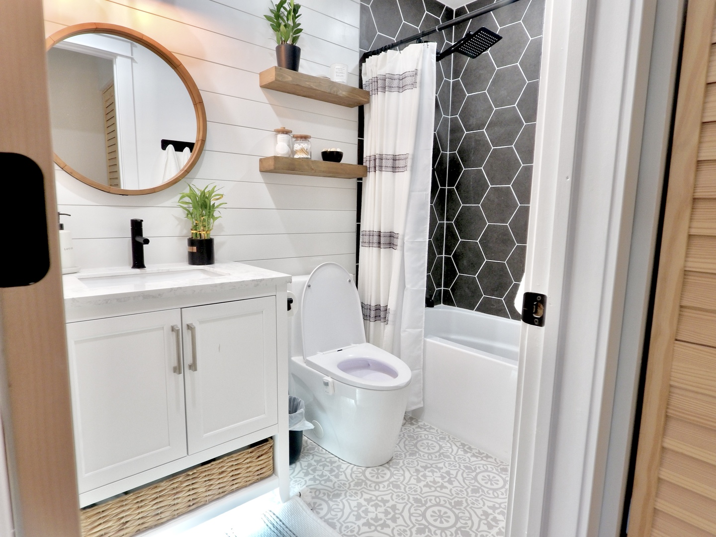 1407 Canyon Run Road Naperville, IL 60565 - Photo 16 of 22 a bathroom with a sink toilet and shower