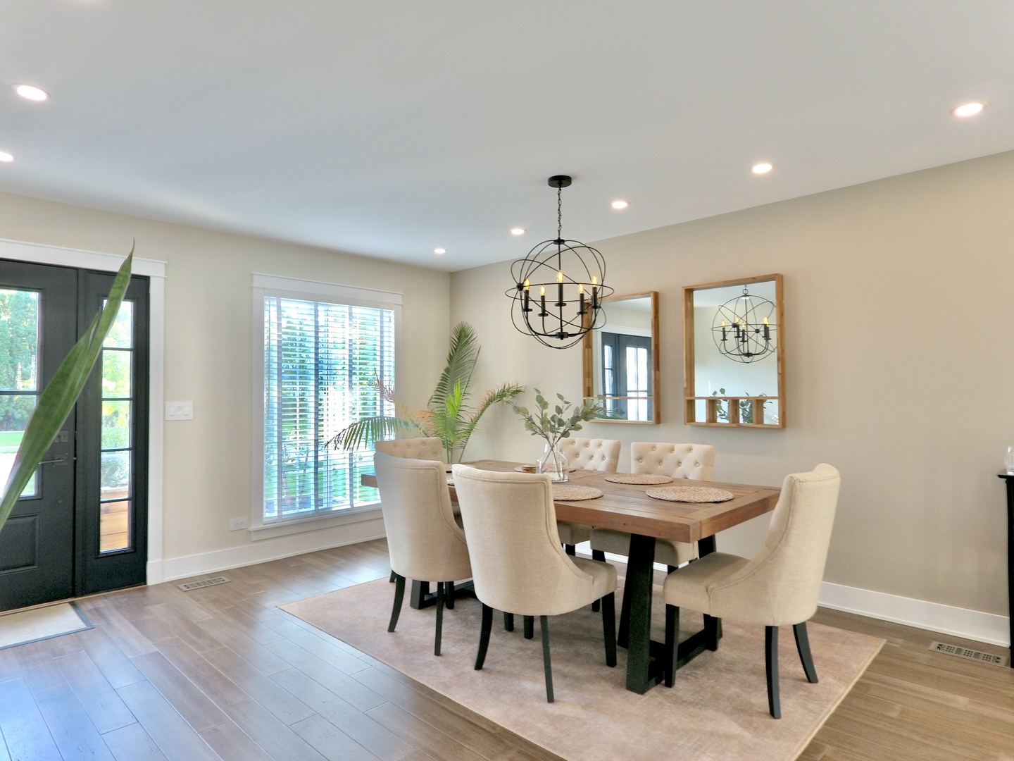 1407 Canyon Run Road Naperville, IL 60565 - Photo 3 of 22 a view of a dining room with furniture window and wooden floor