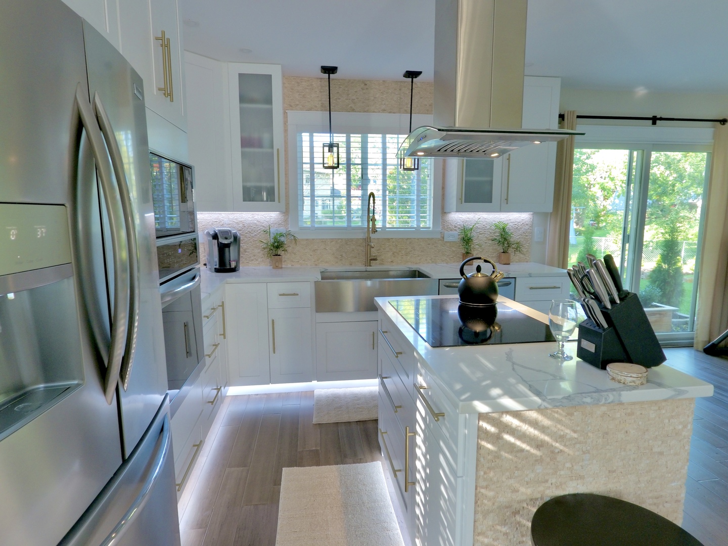 1407 Canyon Run Road Naperville, IL 60565 - Photo 5 of 22 a kitchen with stainless steel appliances granite countertop a refrigerator a sink a stove and white cabinets