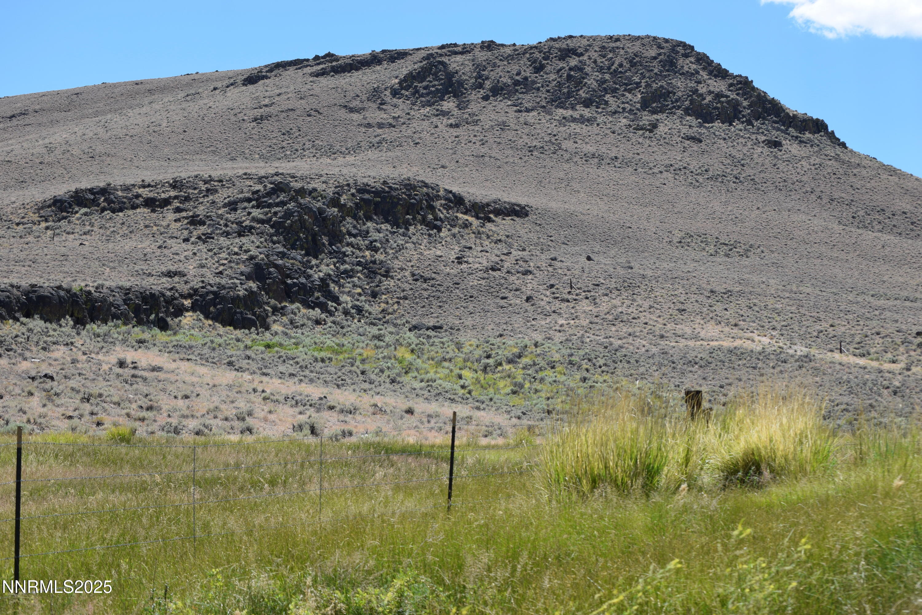 3306 High Rock Road Reno, NV 89510 - Photo 14 of 43 a view of a lake with a mountain in the background