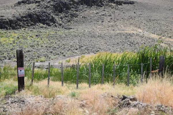 a view of residential space and tree
