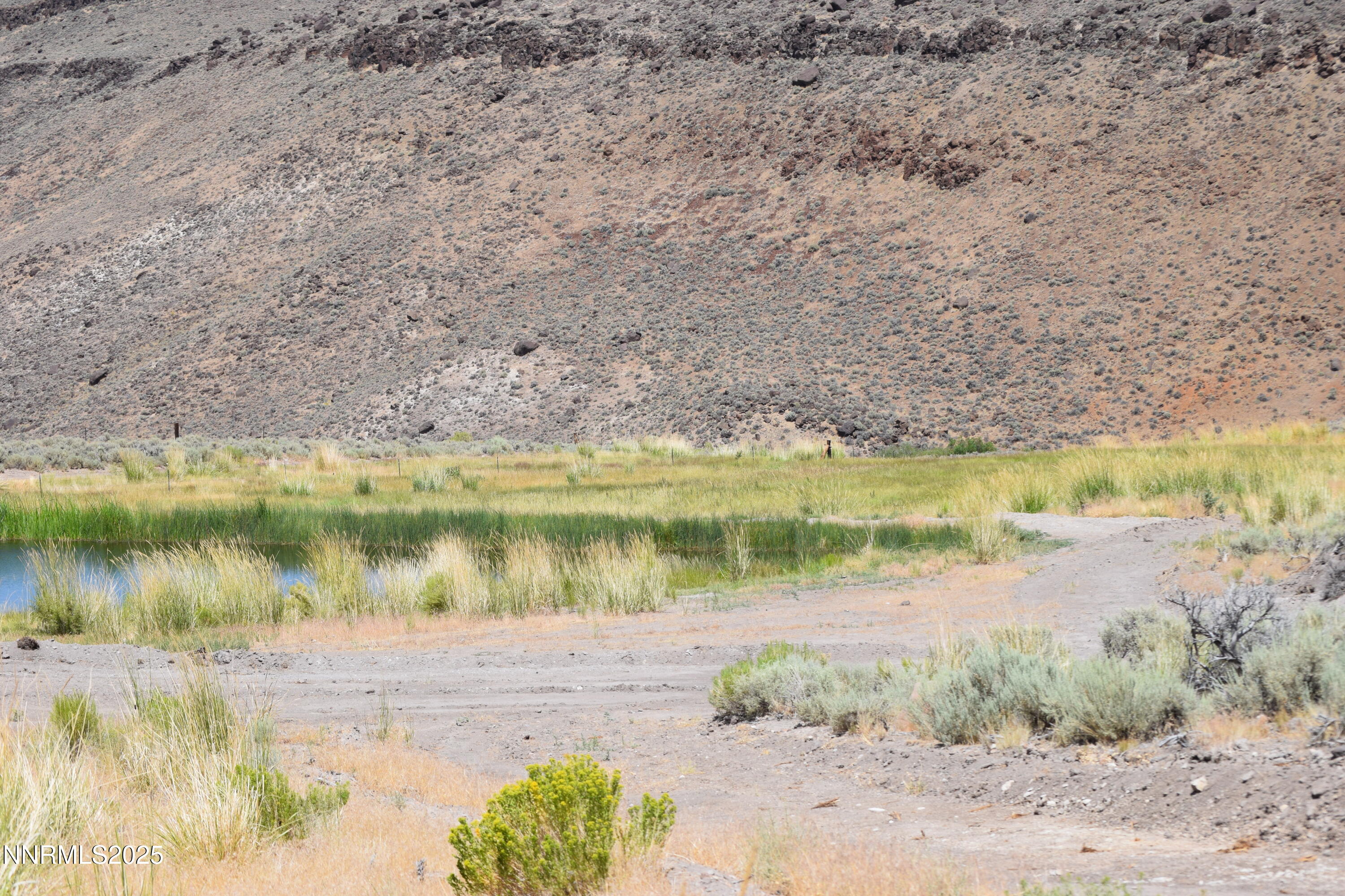 3306 High Rock Road Reno, NV 89510 - Photo 42 of 43 a view of a lake with a beach