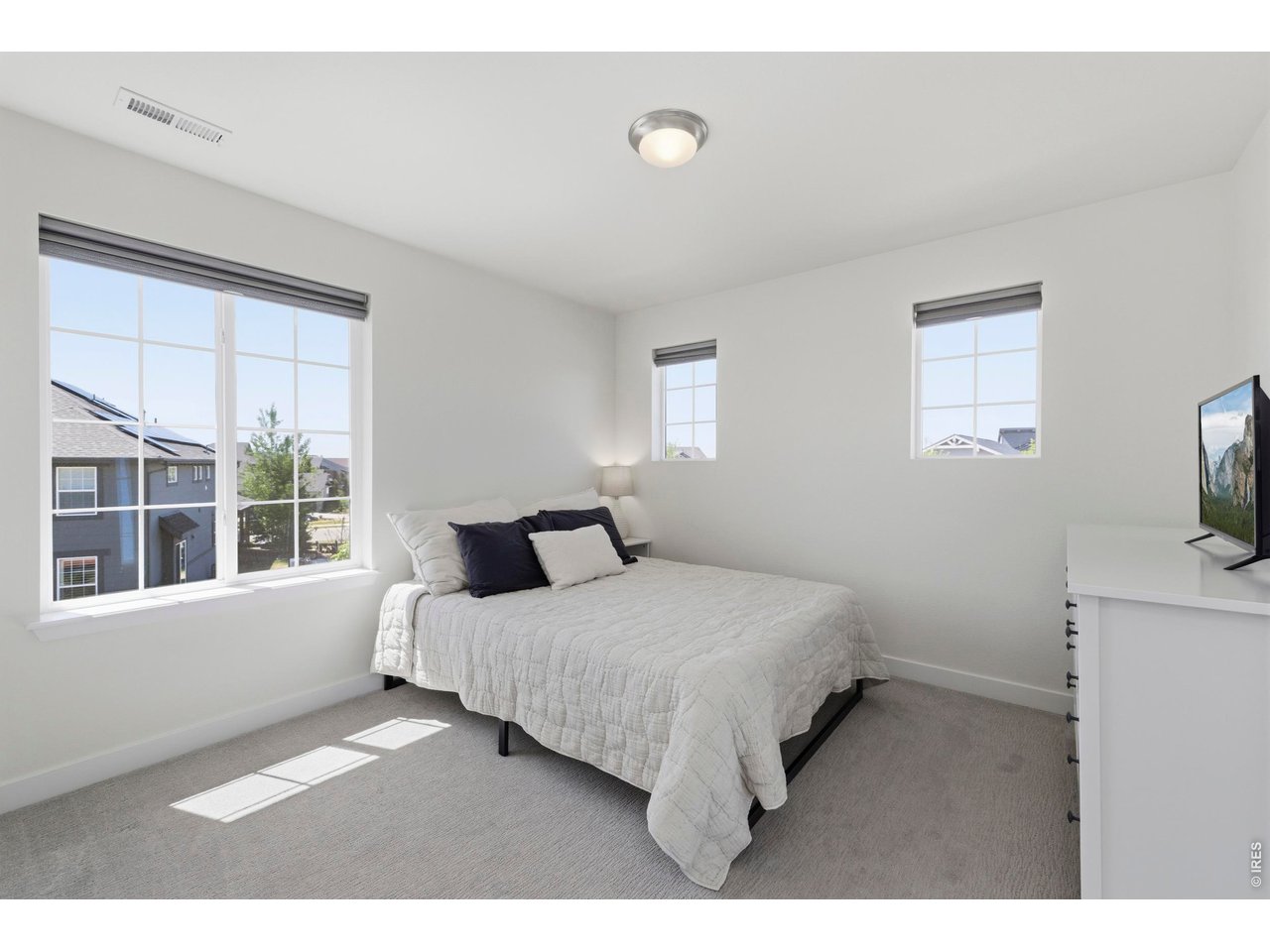 2910 Water View Street Timnath, CO 80547 - Photo 29 of 50 a bedroom with a bed and a window
