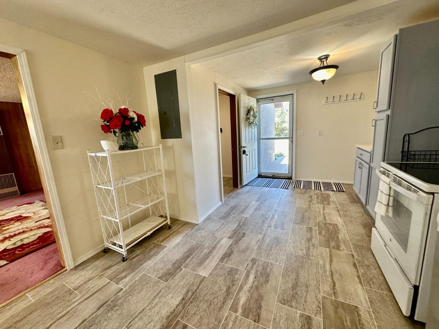 615 Highway 84 Friona, TX 79035 - Photo 11 of 41 a view of a kitchen from the hallway