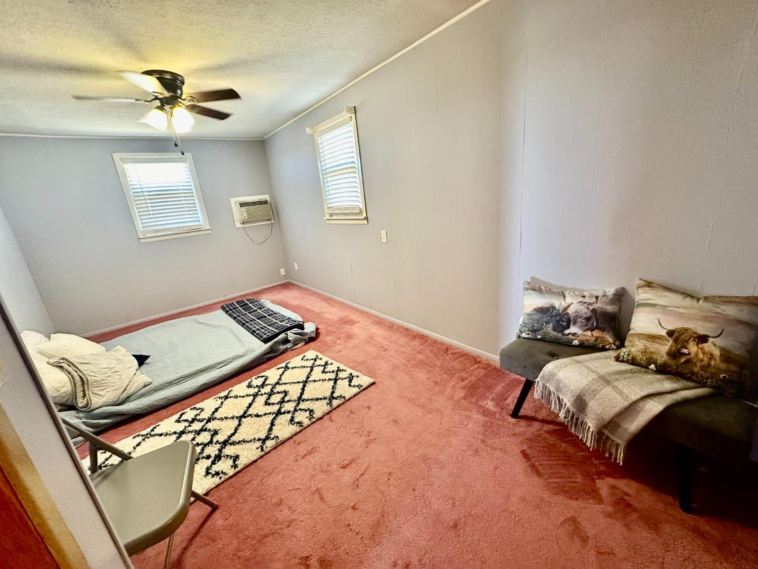 615 Highway 84 Friona, TX 79035 - Photo 18 of 41 a bedroom with a bed and window