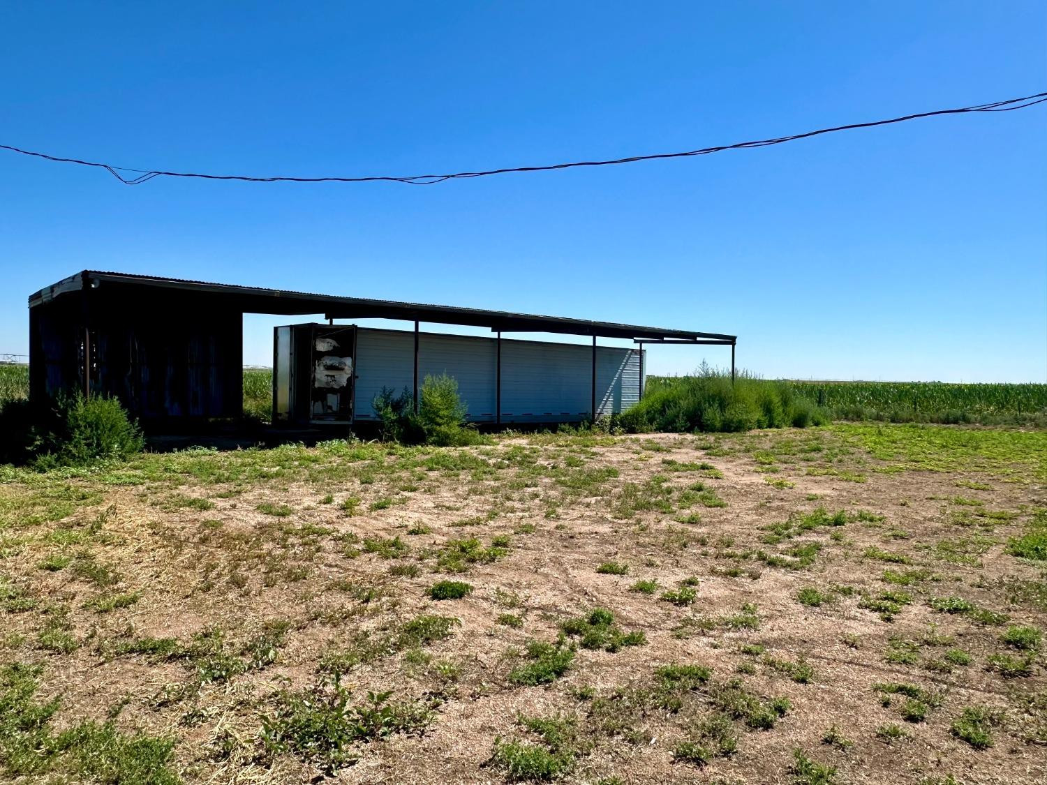 615 Highway 84 Friona, TX 79035 - Photo 30 of 41 a view of a house with a backyard