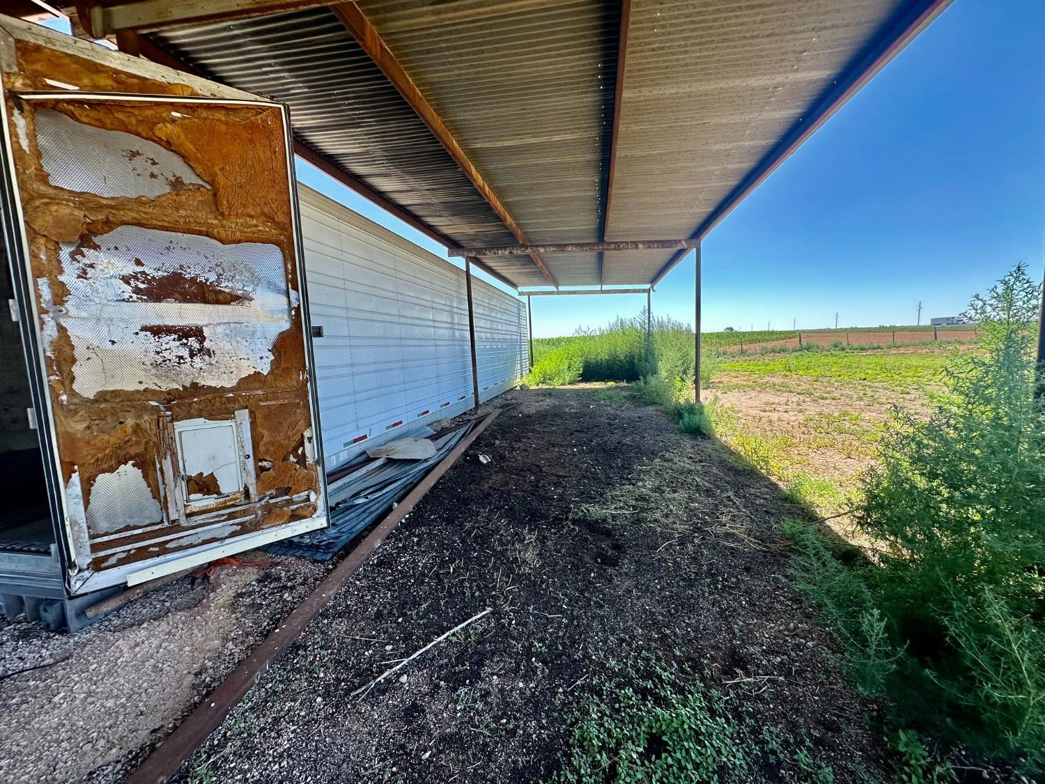 615 Highway 84 Friona, TX 79035 - Photo 32 of 41 a view of a backyard of the house