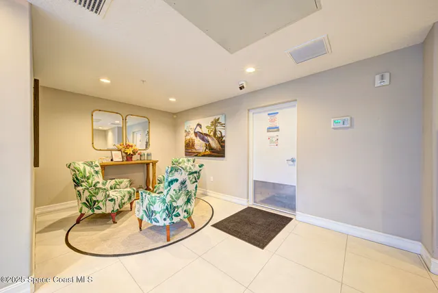 a view of a livingroom with furniture