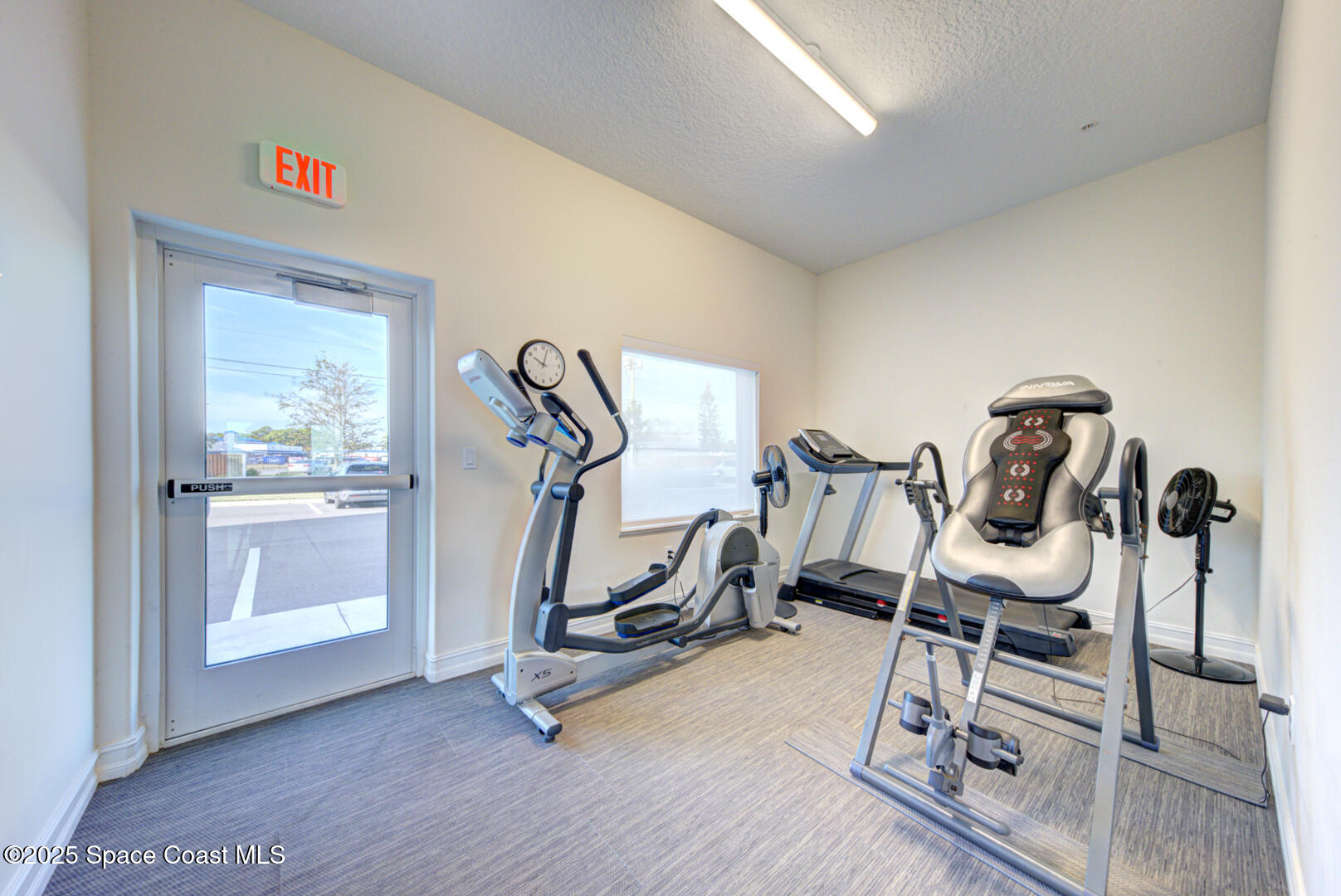 1805 Riverside Drive, Unit 504 Titusville, FL 32780 - Photo 42 of 48 a view of a room with gym equipment