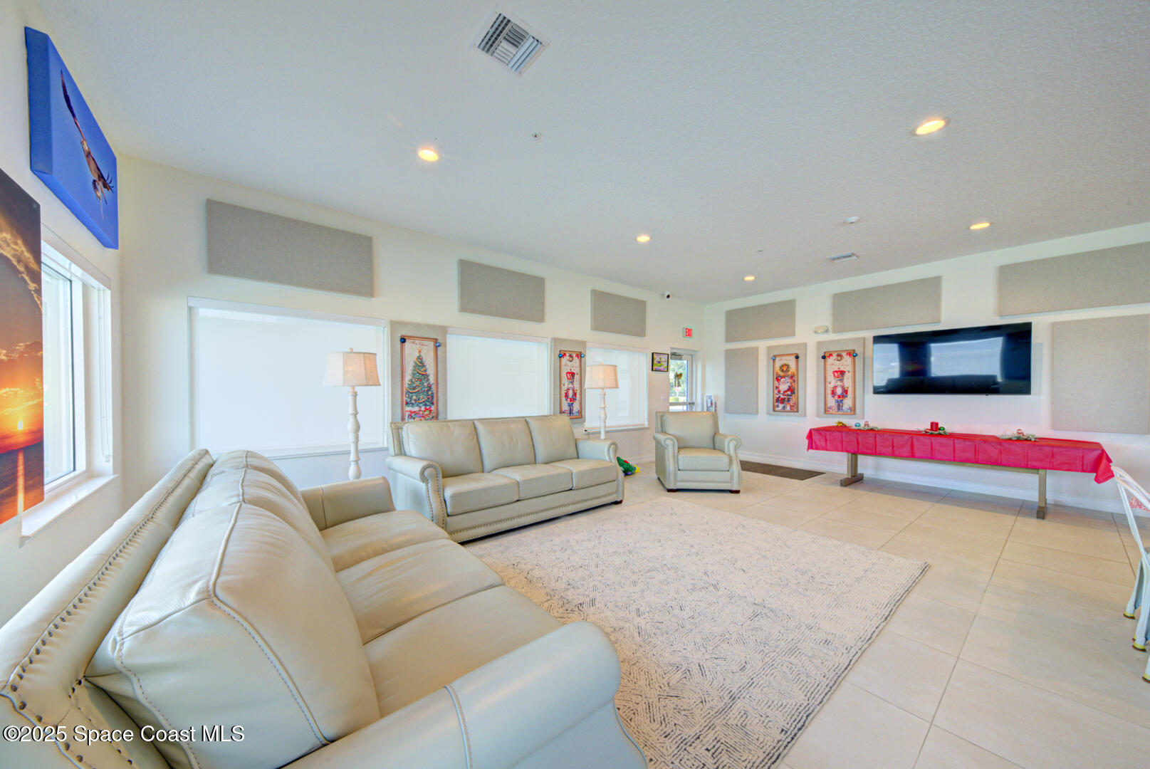 1805 Riverside Drive, Unit 504 Titusville, FL 32780 - Photo 43 of 48 a living room with furniture and kitchen view