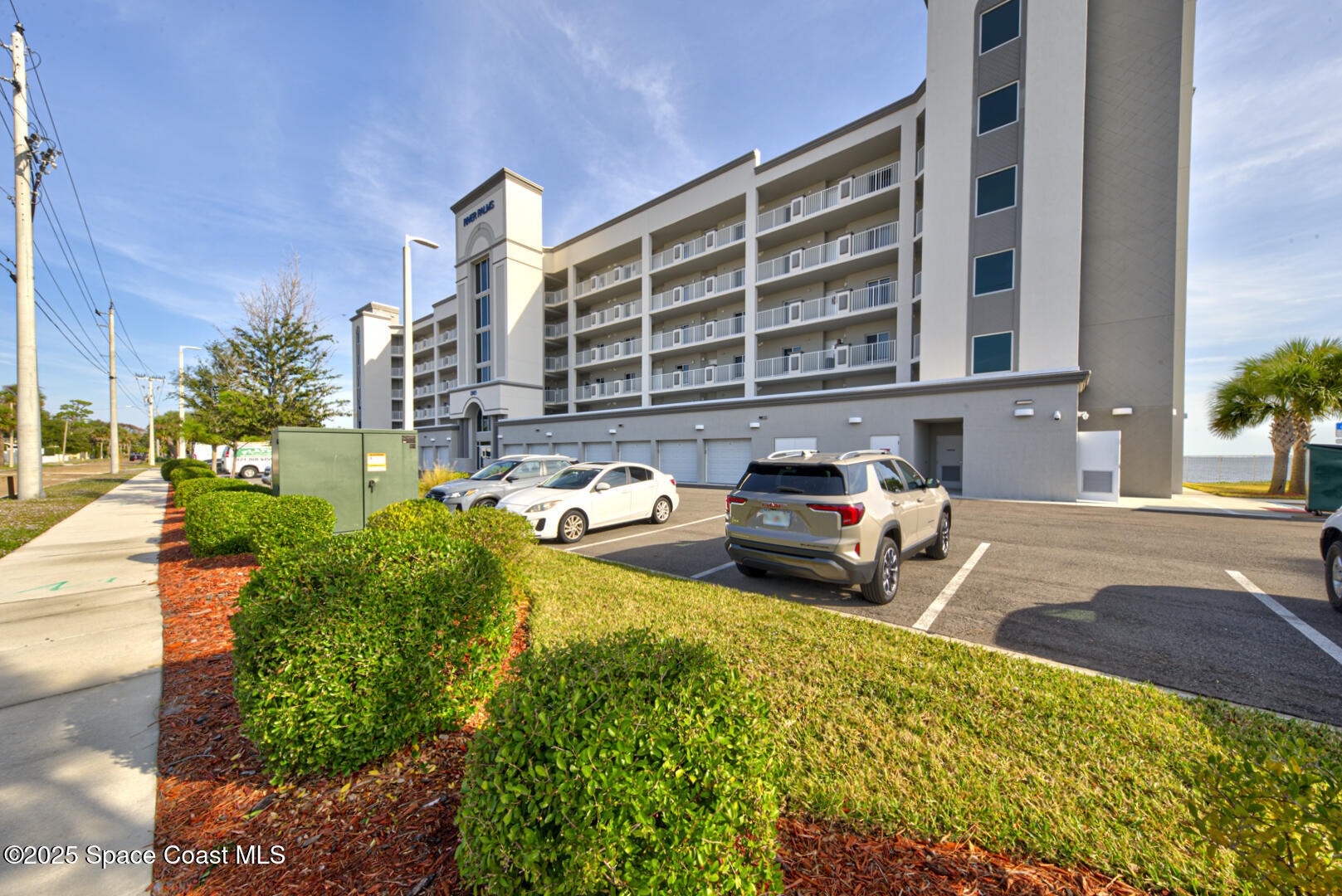 1805 Riverside Drive, Unit 504 Titusville, FL 32780 - Photo 48 of 48 a front view of a house with a yard