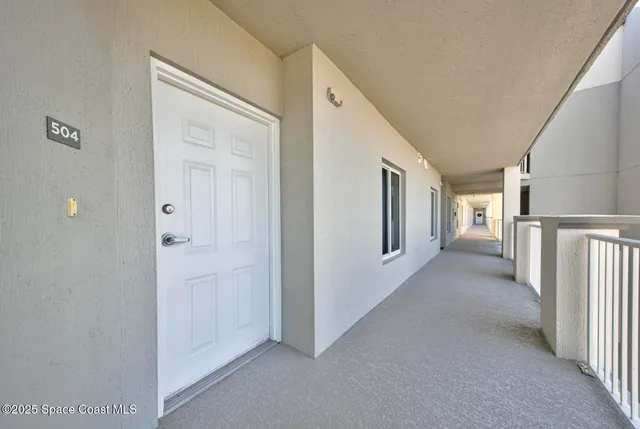 a view of hallway with livingroom