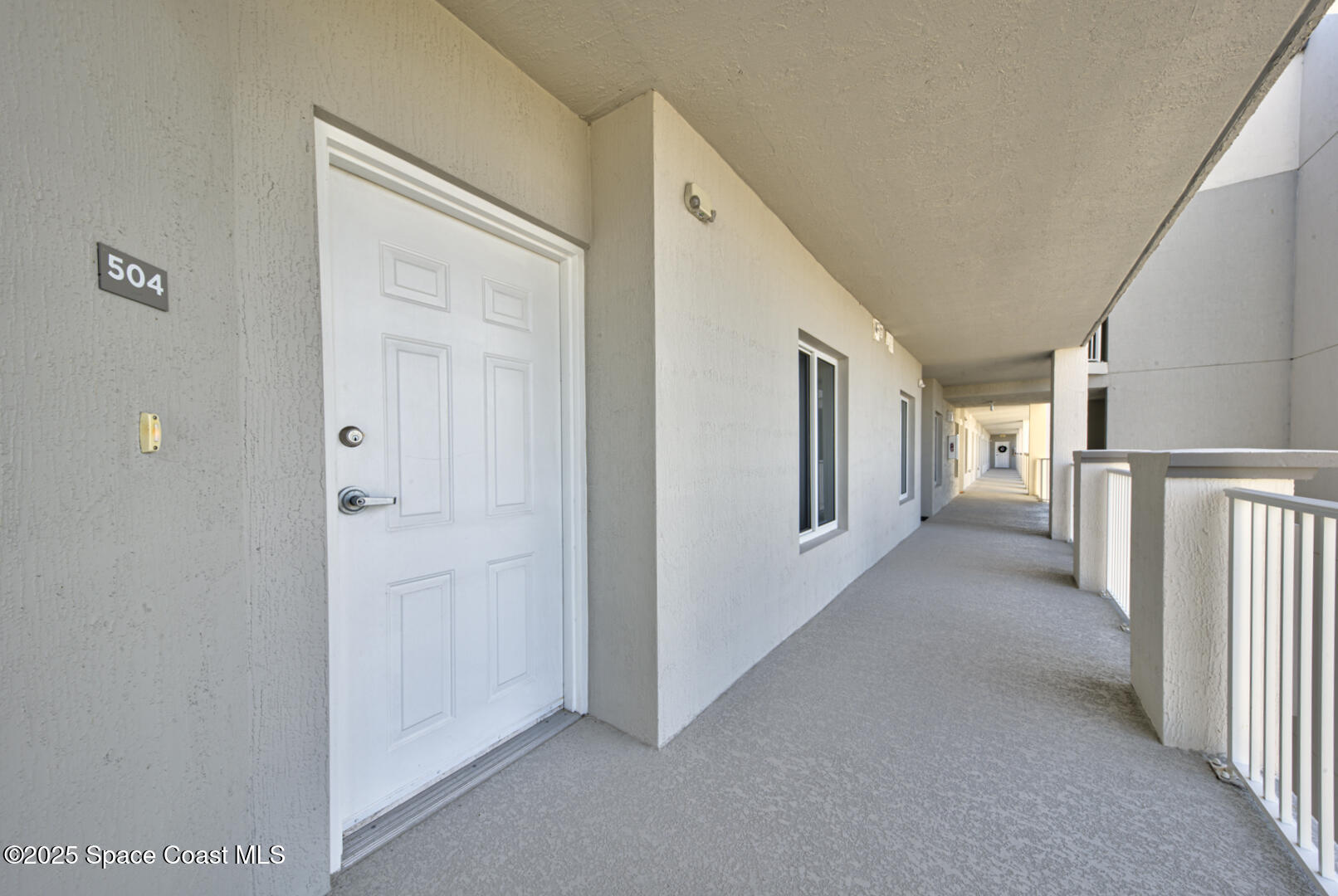 1805 Riverside Drive, Unit 504 Titusville, FL 32780 - Photo 6 of 48 a view of hallway with livingroom