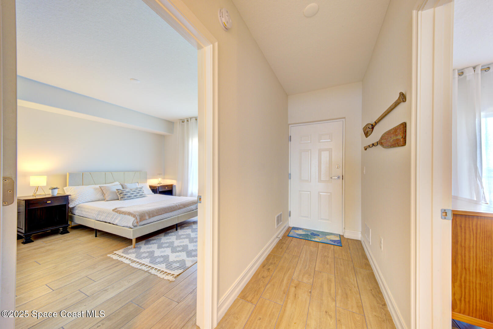 1805 Riverside Drive, Unit 504 Titusville, FL 32780 - Photo 8 of 48 a living room with furniture and a rug