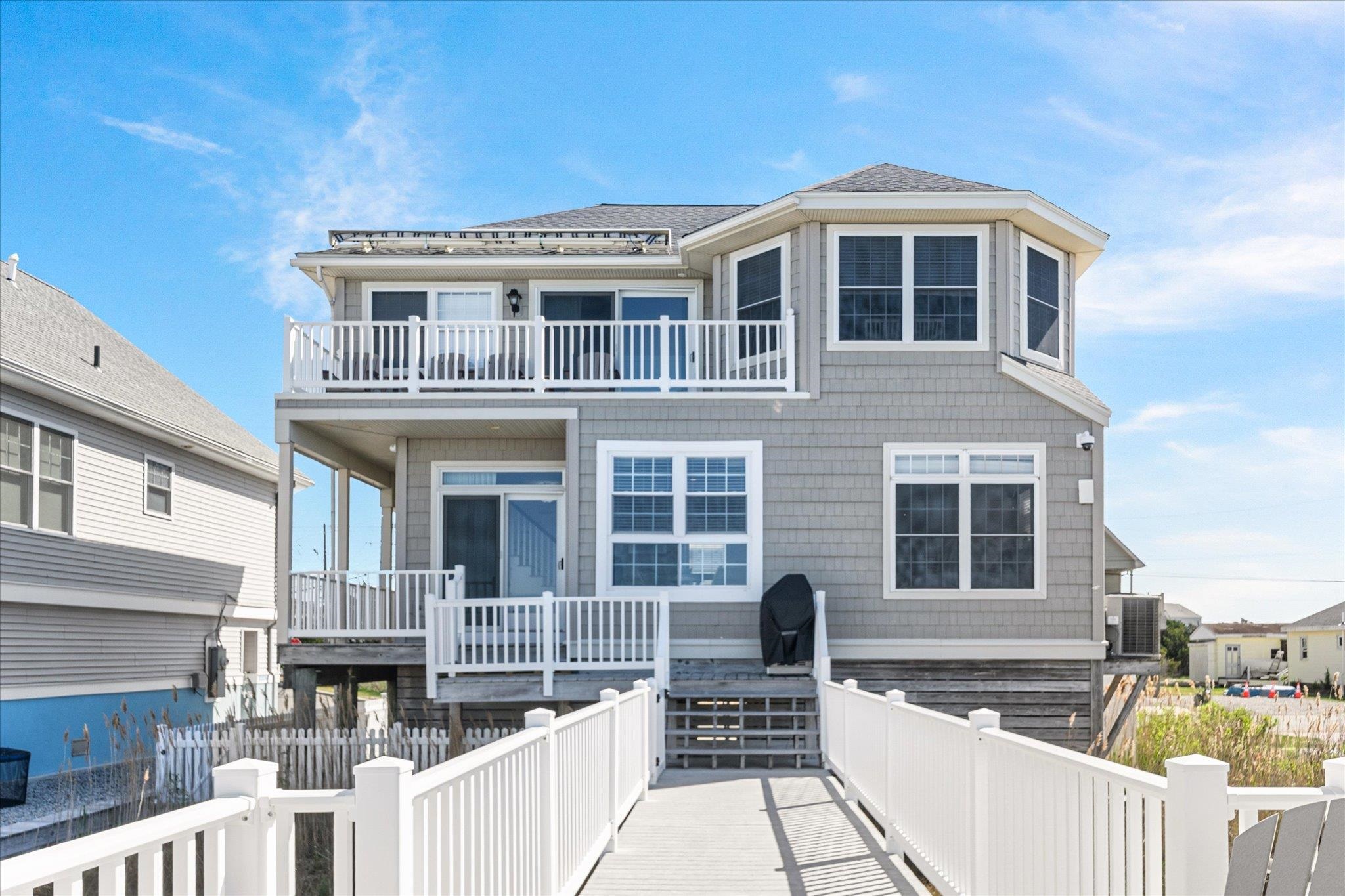 11 Leonard's Lane Avalon, NJ 08202 - Photo 17 of 34 a front view of a house with a yard