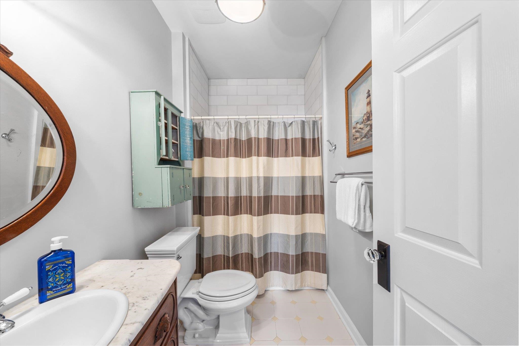 11 Leonard's Lane Avalon, NJ 08202 - Photo 18 of 34 a bathroom with a sink toilet and shower