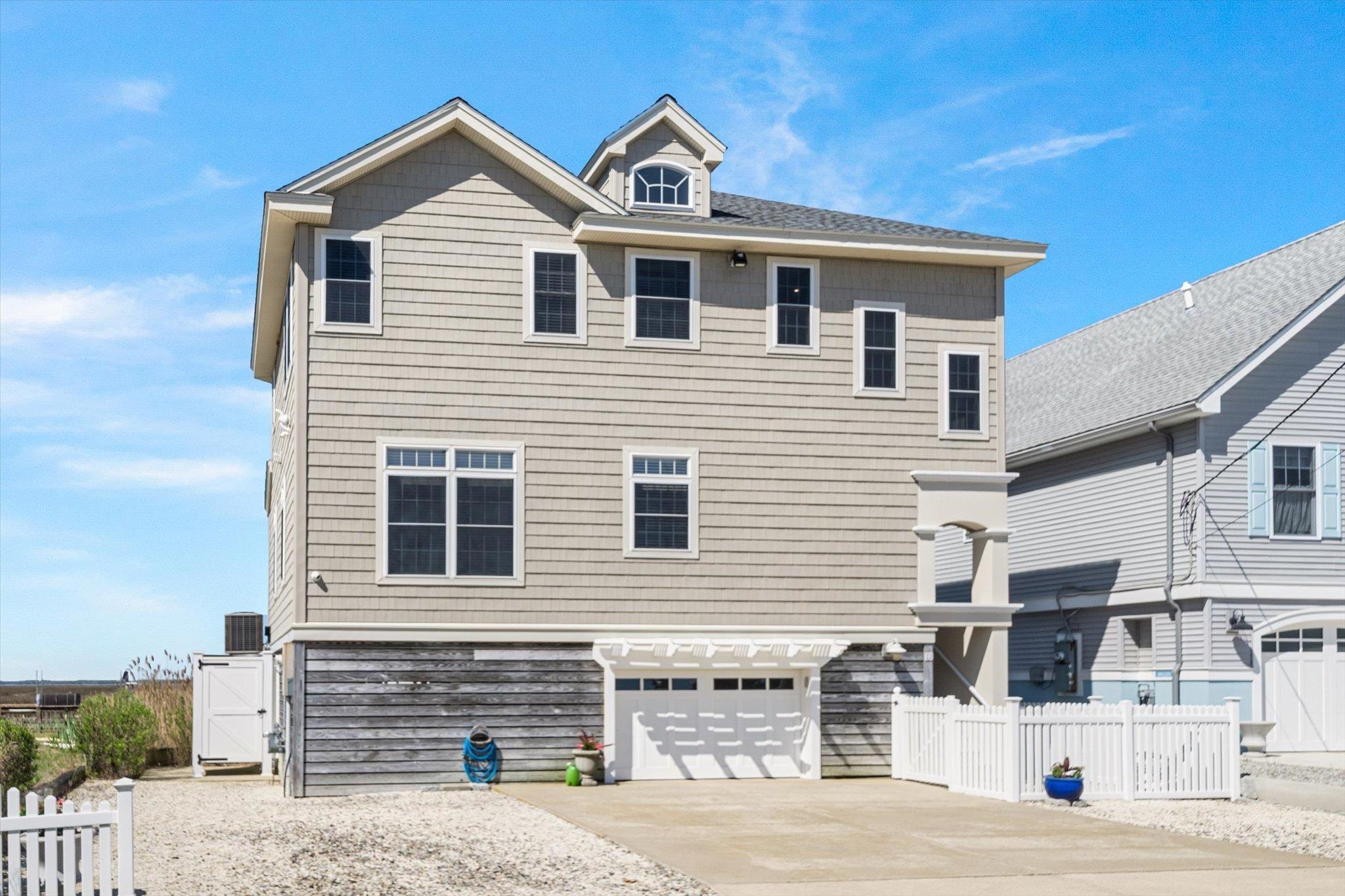 11 Leonard's Lane Avalon, NJ 08202 - Photo 20 of 34 a front view of a house with a street