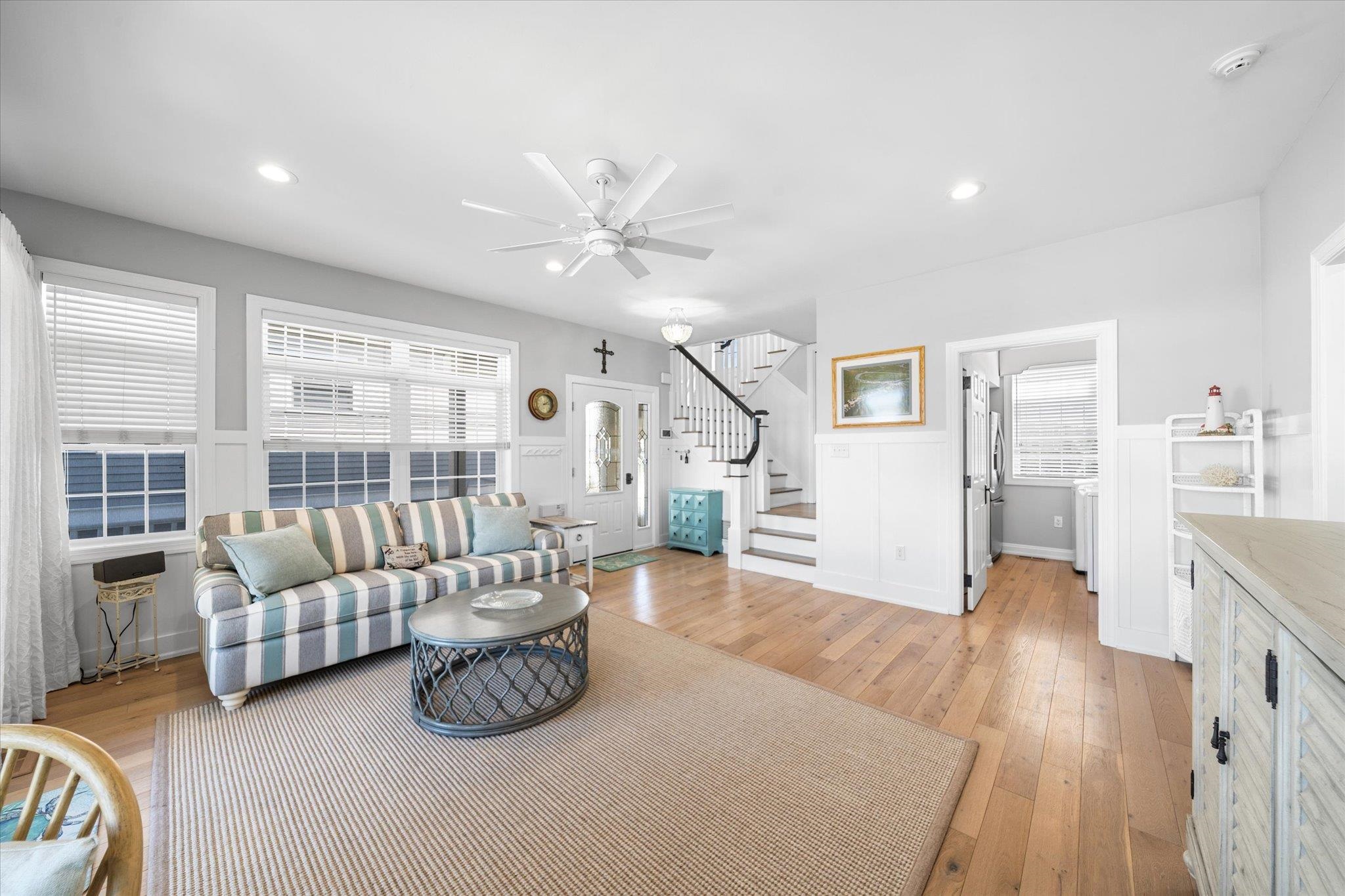 11 Leonard's Lane Avalon, NJ 08202 - Photo 24 of 34 a living room with furniture and wooden floor