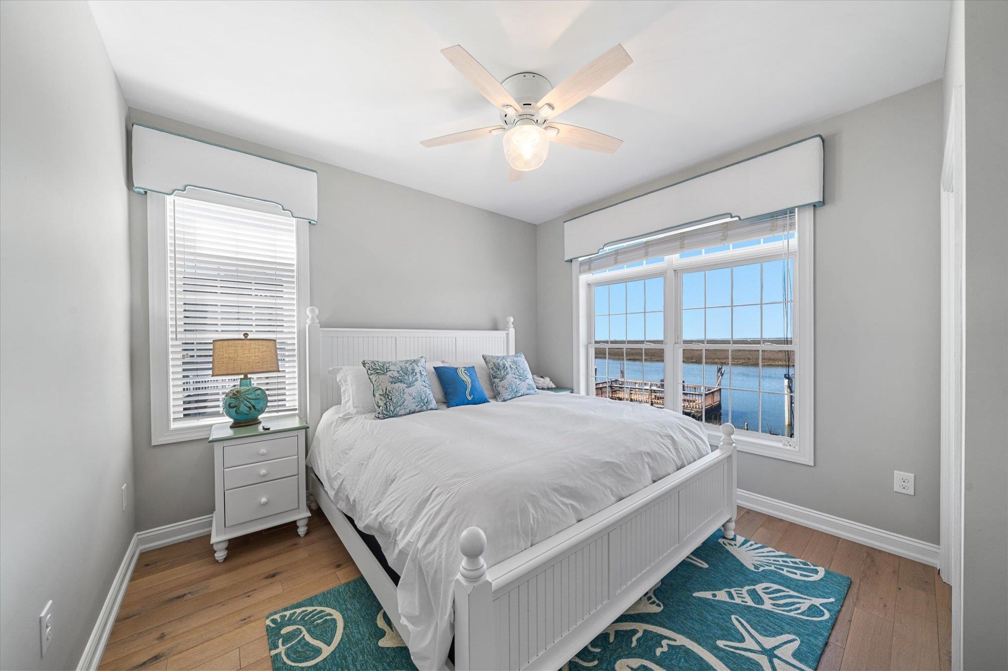 11 Leonard's Lane Avalon, NJ 08202 - Photo 30 of 34 a bedroom with a bed and window