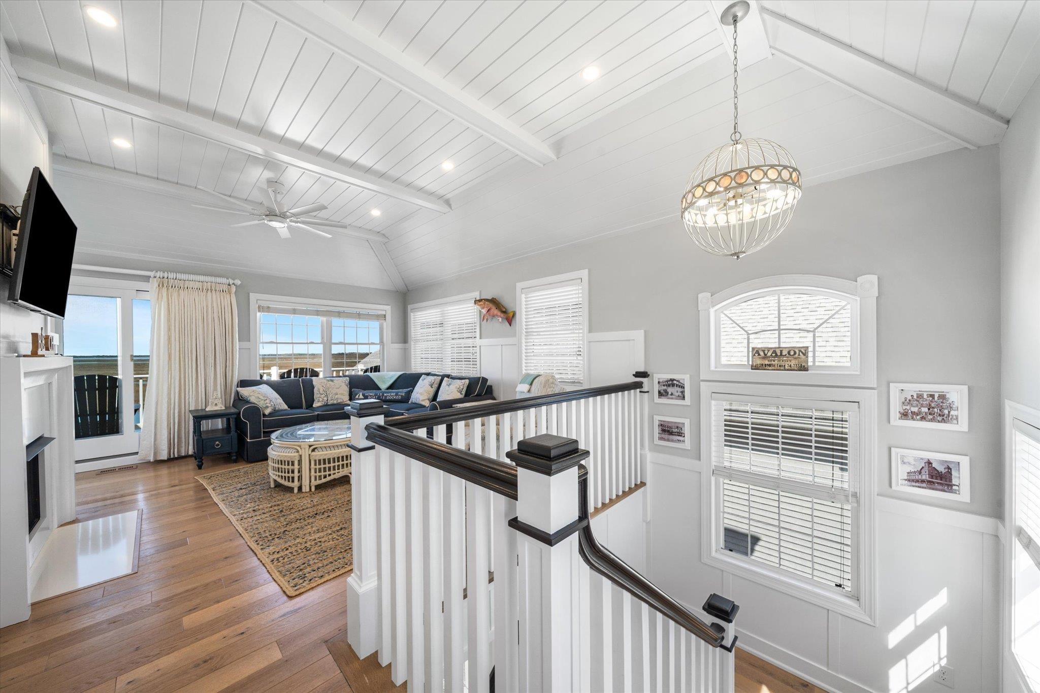 11 Leonard's Lane Avalon, NJ 08202 - Photo 10 of 34 a view of a livingroom with furniture wooden floor a chandelier
