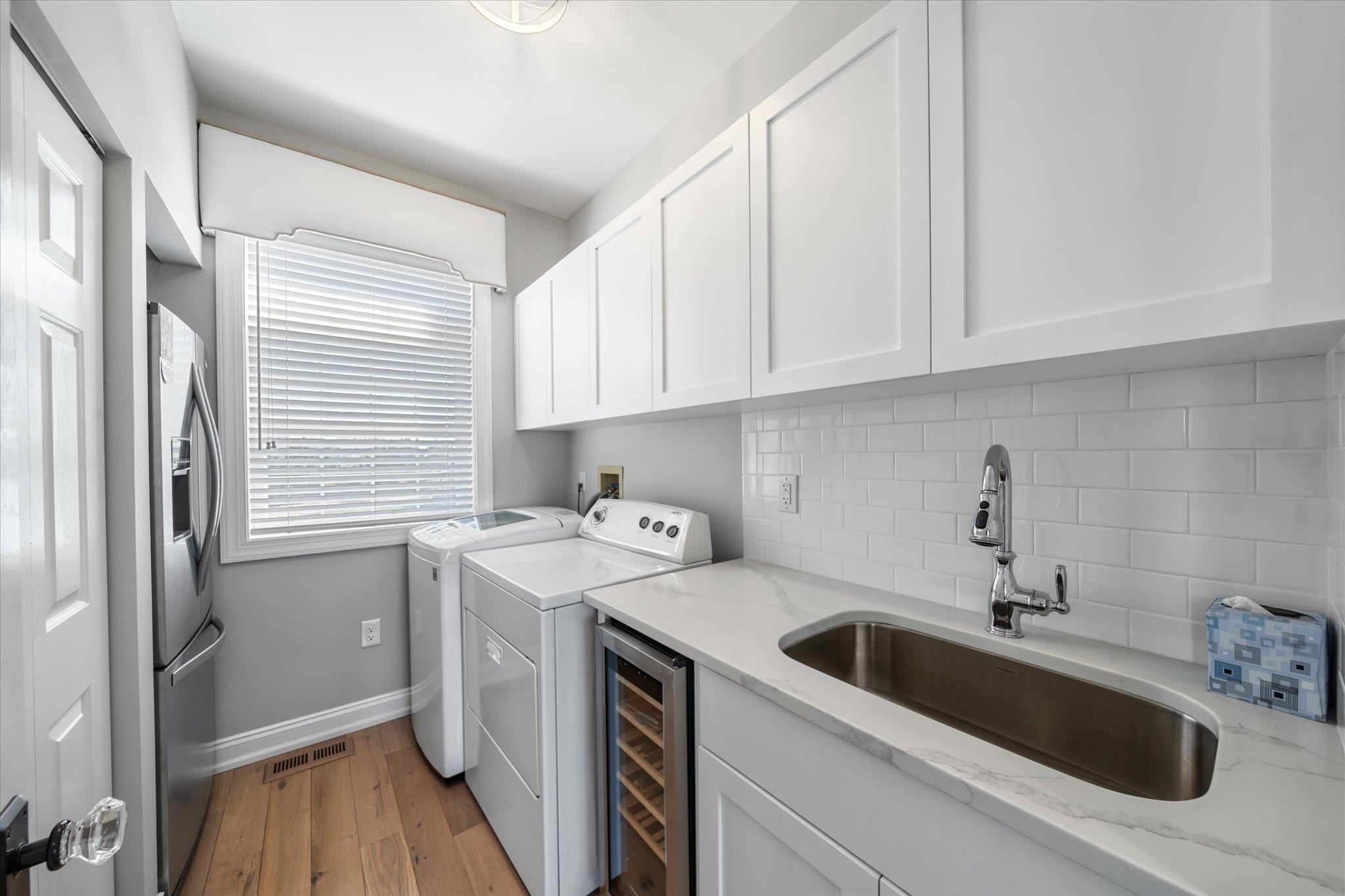 11 Leonard's Lane Avalon, NJ 08202 - Photo 10 of 34 a kitchen with a sink cabinets and stainless steel appliances