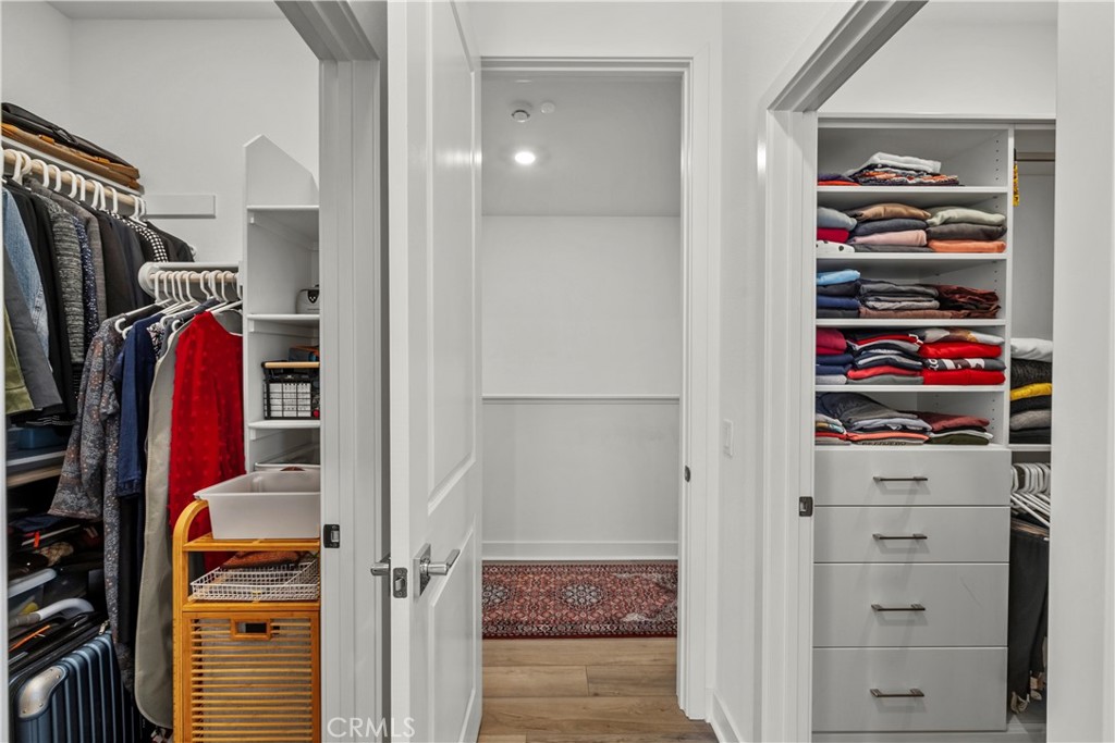 1663 Rosewell Road West Covina, CA 91791 - Photo 20 of 45 a view of walk in closet with clothes and shoes