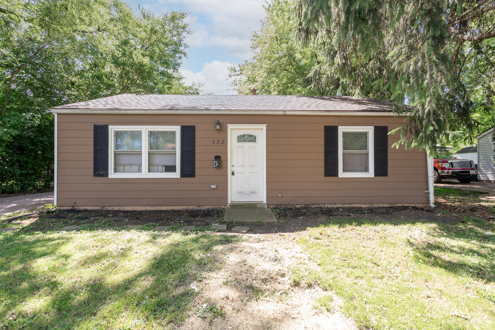 132 Edison Road Joliet, IL 60433 - Photo 15 of 18 a view of a house with a yard