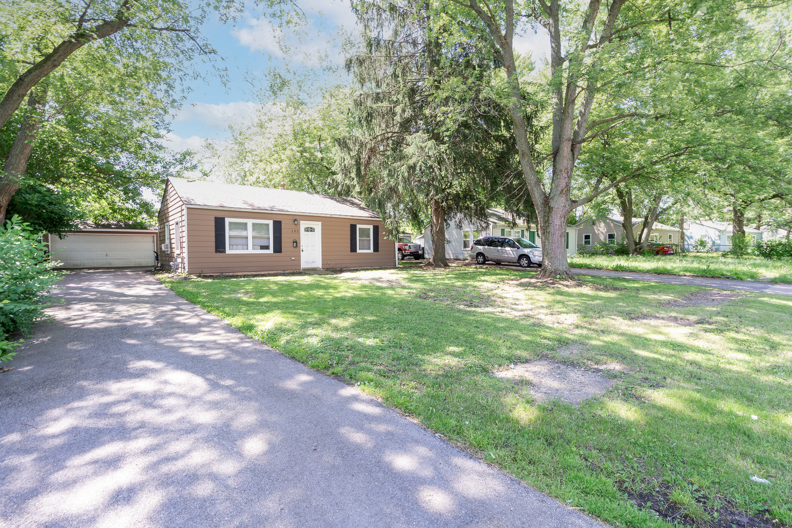 132 Edison Road Joliet, IL 60433 - Photo 17 of 18 a view of a house with a yard