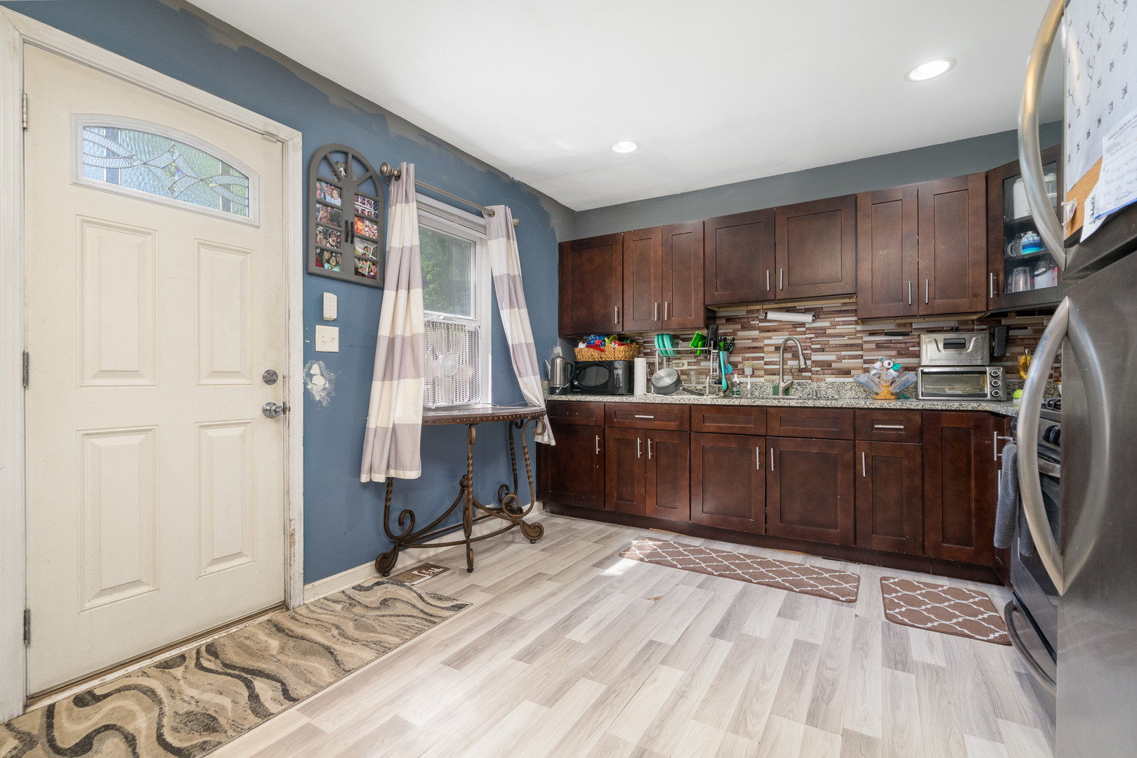 132 Edison Road Joliet, IL 60433 - Photo 6 of 18 a room with a bed and a cabinets