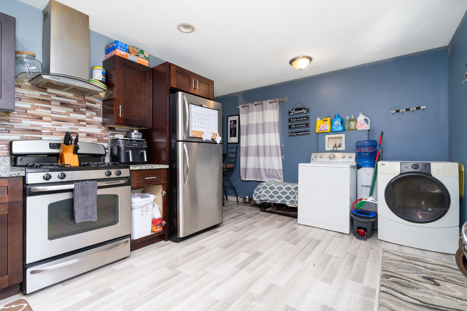 132 Edison Road Joliet, IL 60433 - Photo 7 of 18 a kitchen with a refrigerator and a stove