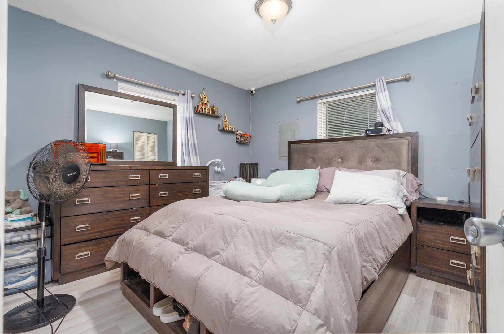 132 Edison Road Joliet, IL 60433 - Photo 8 of 18 a bedroom with a bed and a dresser