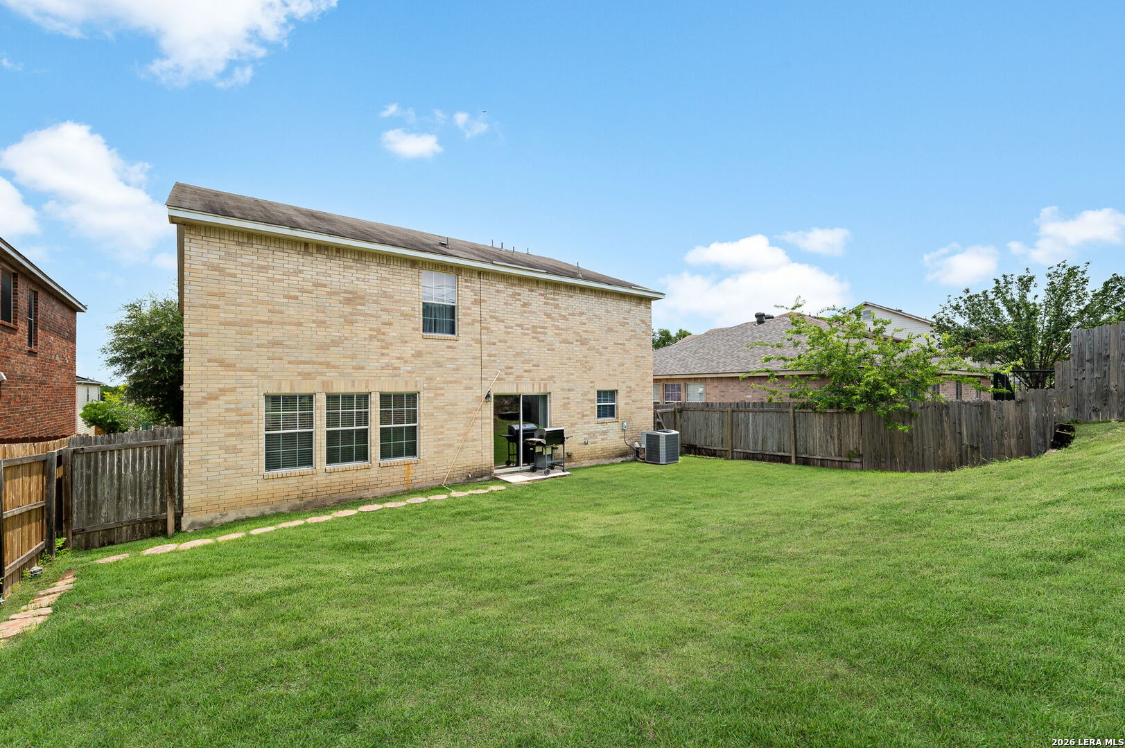 7207 Avery Road Live Oak, TX 78233 - Photo 31 of 32 a view of a house with a yard and porch