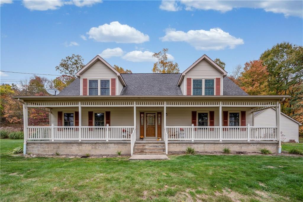 Beautiful 4 BR , 2 1/2 Bath Cape Cod Home on private 3 Acre setting
