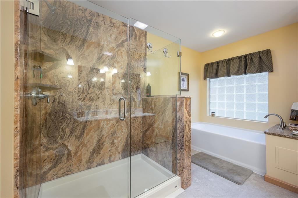 775 Meridian Road Renfrew, PA 16053 - Photo 15 of 25 Beautiful newly updated Master Bath has beautiful double shower and tub.