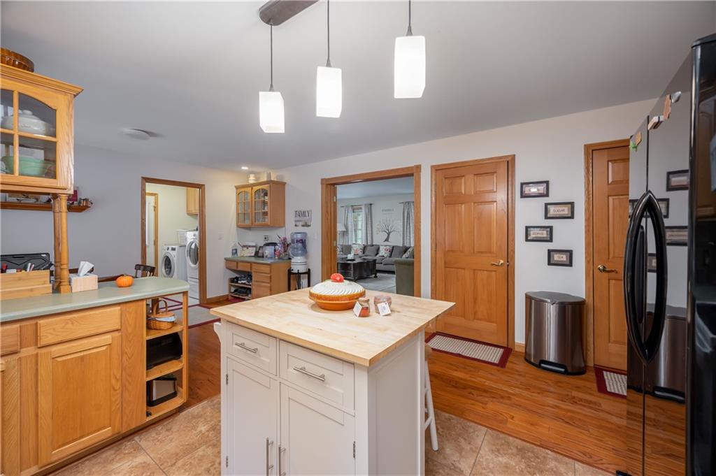 775 Meridian Road Renfrew, PA 16053 - Photo 7 of 25 Kitchen looks towards laundry room to Left, Living Room to Front and a pantry to Right
