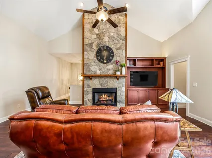 a bedroom with a bed and a fireplace