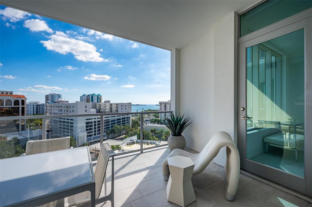 111 South Pineapple Avenue, Unit 1013 Sarasota, FL 34236 - Photo 28 of 62 a view of a balcony with furniture