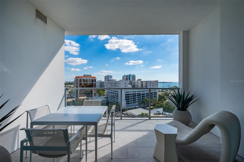 111 South Pineapple Avenue, Unit 1013 Sarasota, FL 34236 - Photo 29 of 62 a view of a livingroom with furniture and a potted plant